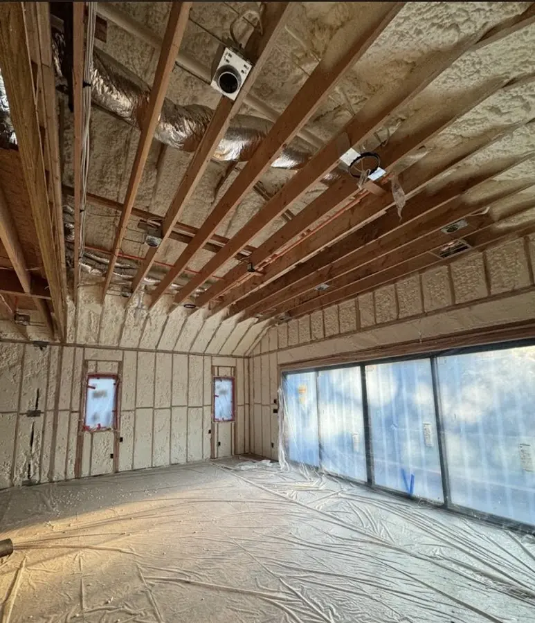Interior walls and ceiling insulated with spray foam during new construction in Silver Lakes